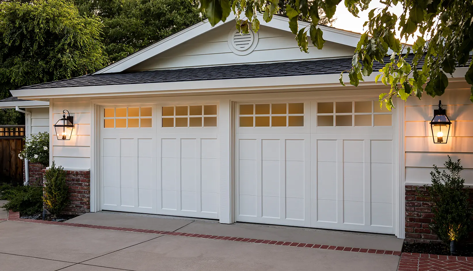 Clopay Coachman composite overlay garage door with wood-look finish