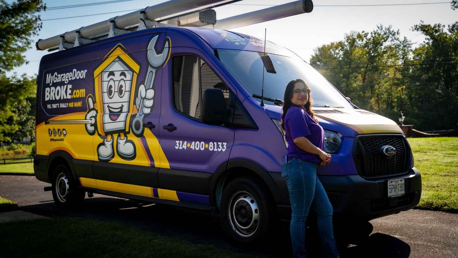 Michelle Stone with the MyGarageDoorBROKE.com™ service truck